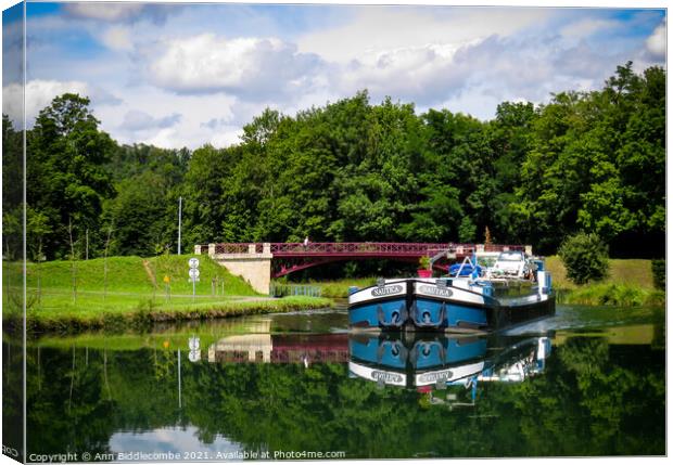 Commercial Barge on the Canal Canvas Print by Ann Biddlecombe