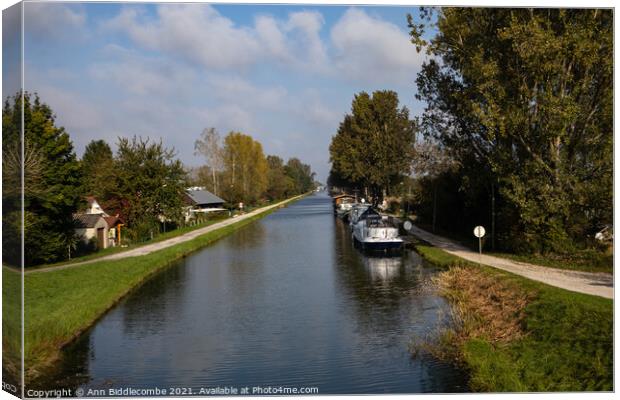 The start of the Canal De Bourgogne Canvas Print by Ann Biddlecombe