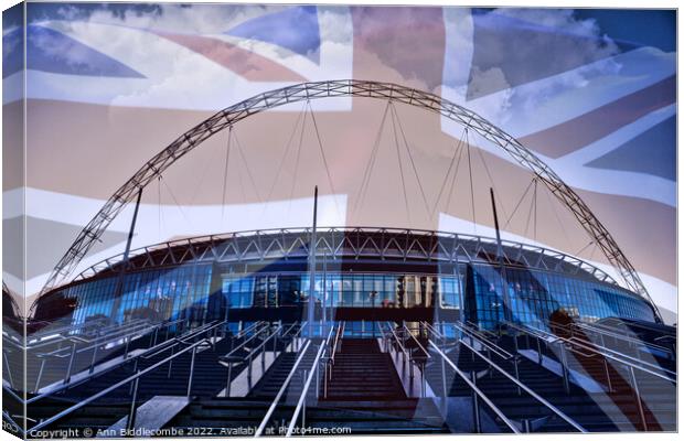 Wembley Stadium with faded Union Jack Canvas Print by Ann Biddlecombe
