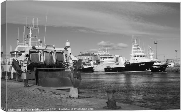 Black and white French fishing boats in Sete Canvas Print by Ann Biddlecombe