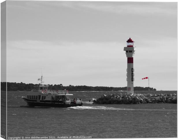 Ferry and lighthouse in cannes in monochrome and red Canvas Print by Ann Biddlecombe