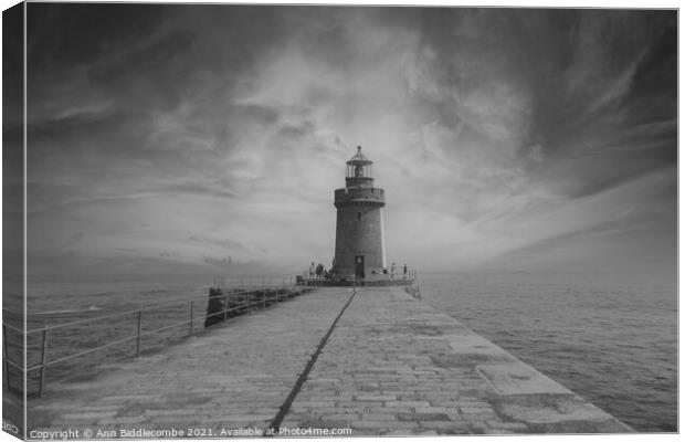 Guernsey Lighthouse in black and white Canvas Print by Ann Biddlecombe