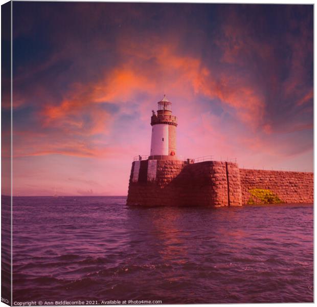Guernsey Lighthouse from the sea Canvas Print by Ann Biddlecombe