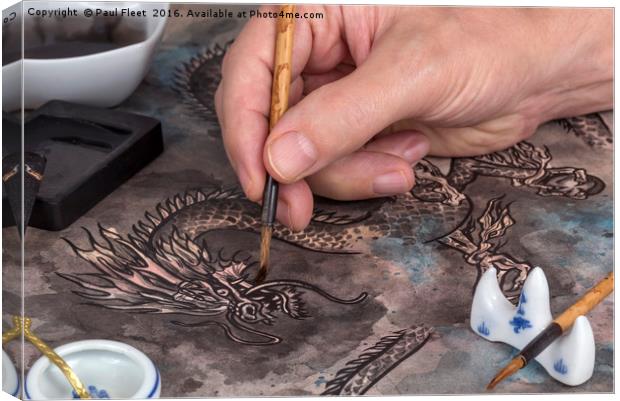 Artist painting a Chinese dragon Canvas Print by Paul Fleet