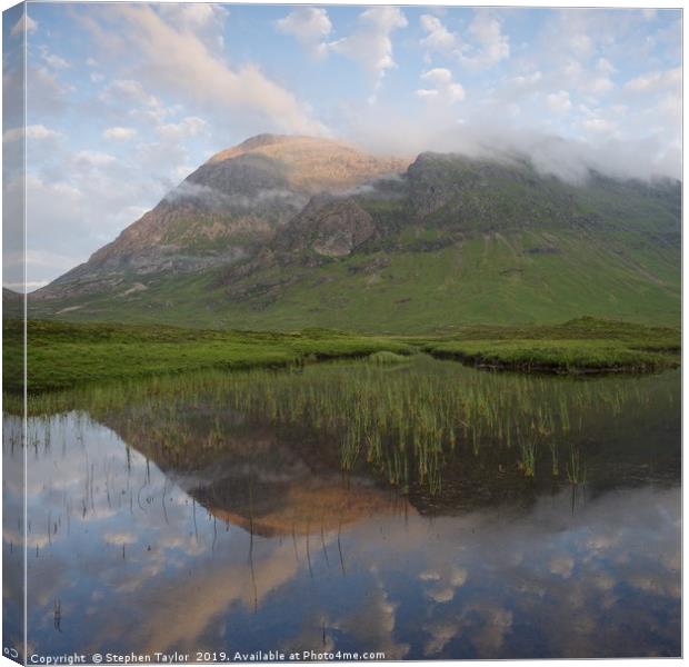 Buachaille Etive Mor reflected in Lochan na Fola Canvas Print by Stephen Taylor