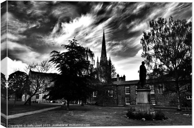 Wild skies at Norwich Cathedral Canvas Print by Sally Lloyd