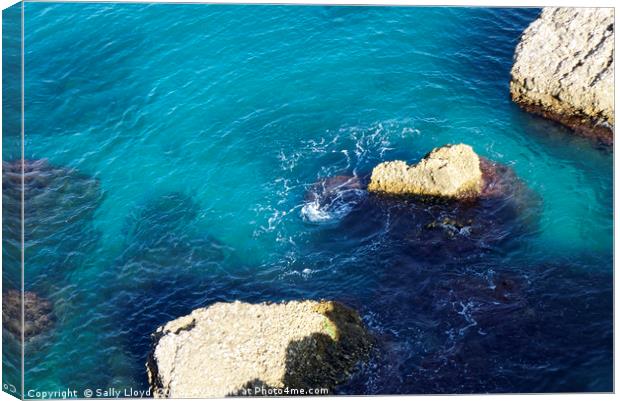 Turquoise sea at Nerja, Spain Canvas Print by Sally Lloyd
