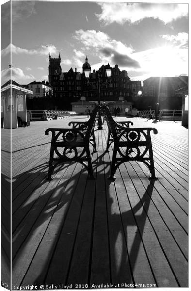 Cromer pier shadows Canvas Print by Sally Lloyd