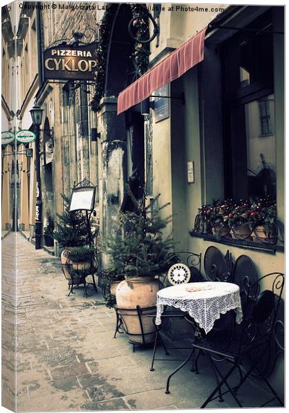 Street cafe in the old town in Krakow Canvas Print by Malgorzata Larys