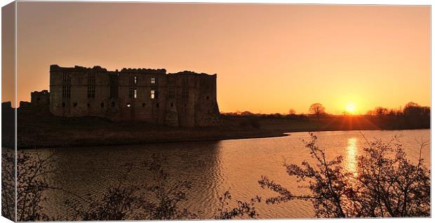  Sunset over Carew Castle Canvas Print by Mandy Llewellyn