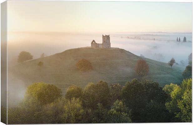 Rising Above The Fog Canvas Print by Rich Wiltshire