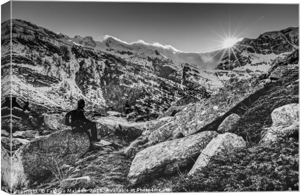 Watching The Sun Setting Over The Mountains Canvas Print by Fabrizio Malisan