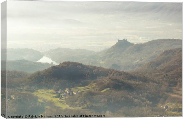 Autumnal landscape and fog over the castle Canvas Print by Fabrizio Malisan