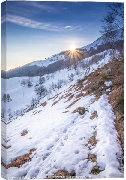 The Sun Sets Behind The Mountain Snow Winter Weather Italy Canvas Print by Fabrizio Malisan