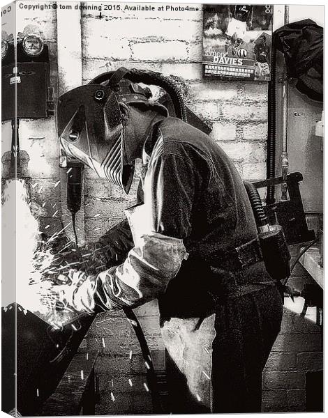  The Welder Canvas Print by tom downing