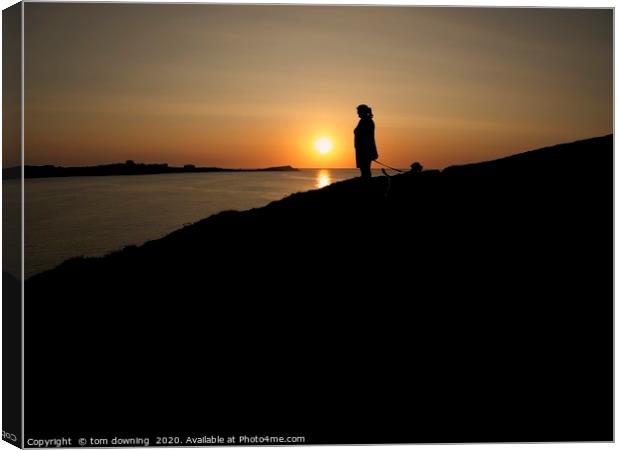 Sunset alone with the dog Canvas Print by tom downing