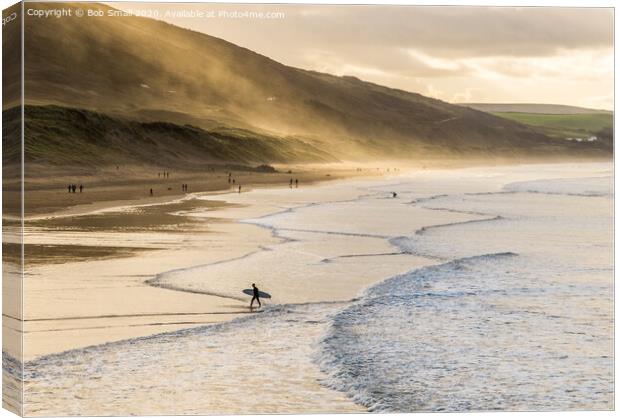 Heading home from the surf at Woolacombe Canvas Print by Bob Small