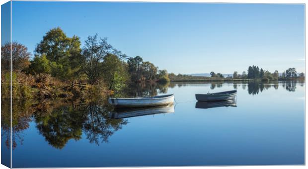 Reflecting Loch Canvas Print by Garry Quinn
