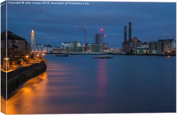  first light over the thames Canvas Print by mike cooper