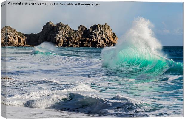 Wave Tunnel on Porcurno Beach Canvas Print by Brian Garner