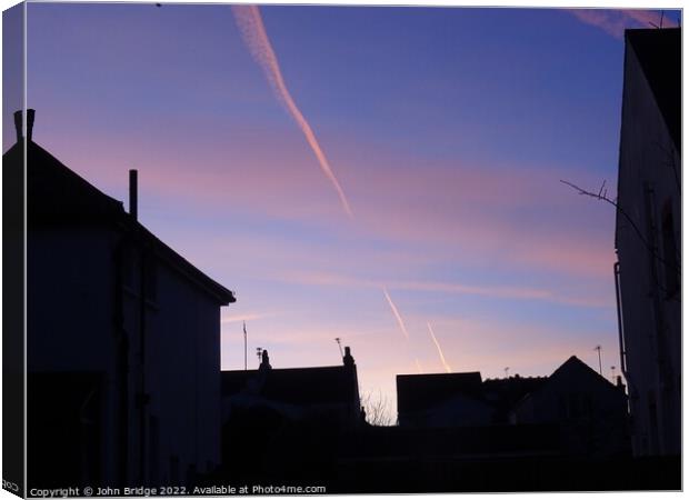 Sunset over Leigh on Sea Canvas Print by John Bridge