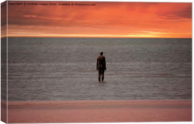 Statue on Crosby beach with a sunset Canvas Print by Andrew Heaps