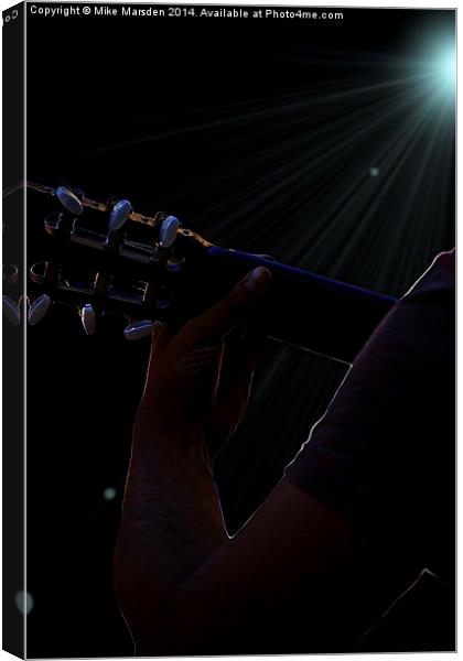 Man playing guitar in concert  Canvas Print by Mike Marsden