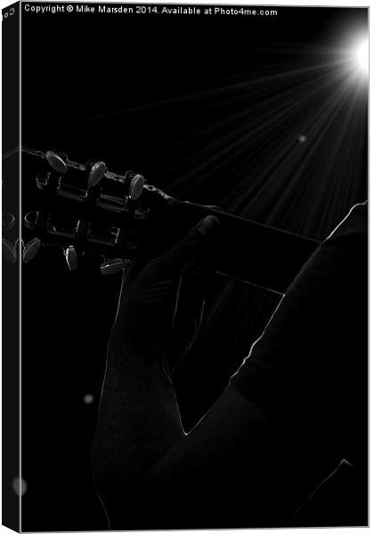 Man playing guitar in concert   Canvas Print by Mike Marsden