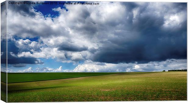 Clouds over Fring, Norfolk Canvas Print by Lynda Simpson