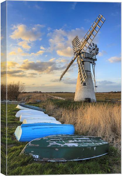 Boats at Thurne Drainage Mill Canvas Print by Andrew Ray