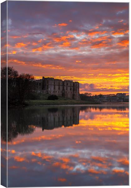 Sunset at Carew Castle Canvas Print by Andrew Ray