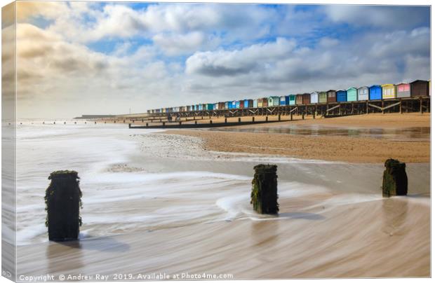 Beach huts at Frinton-on-Sea Canvas Print by Andrew Ray