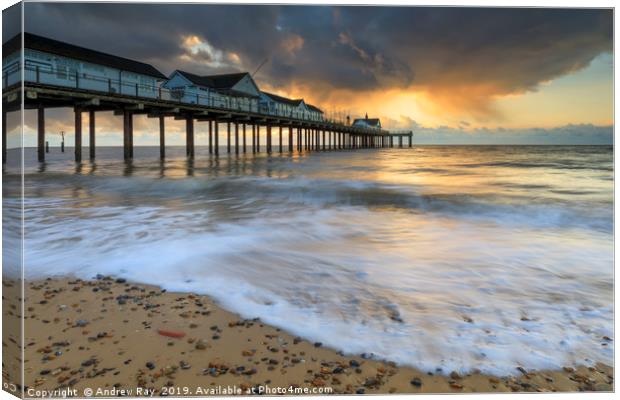 Stormy clouds at sunrise (Southwold Pier) Canvas Print by Andrew Ray