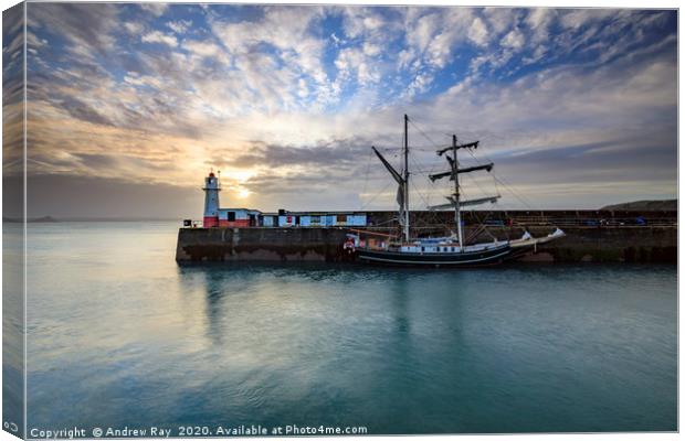 Lighthouse and tall ship (Newlyn) Canvas Print by Andrew Ray