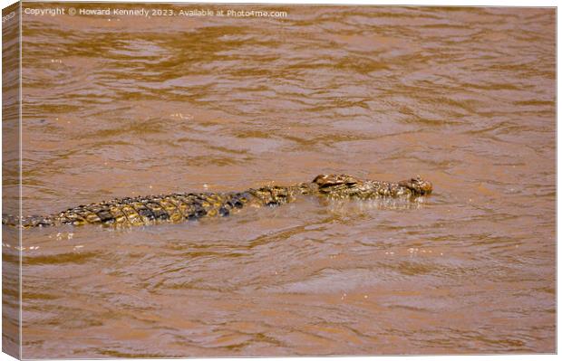 Nile Crocodile swimming in the Mara River Canvas Print by Howard Kennedy