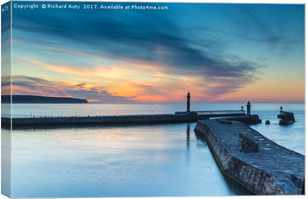 Whitby Harbour Sunset Canvas Print by Richard Auty