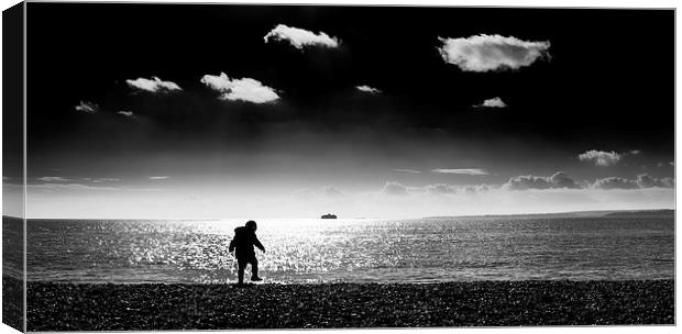 The Boy on The Beach Canvas Print by Simon Rutter