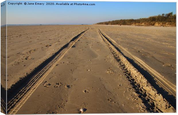 Tracks in the sand at Cefn Sidan, Pembrey, Carmart Canvas Print by Jane Emery