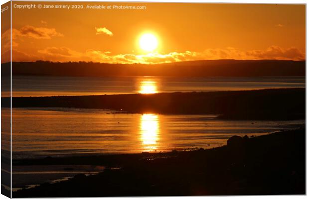 Sunset over North Gower, from Loughor Estuary Canvas Print by Jane Emery