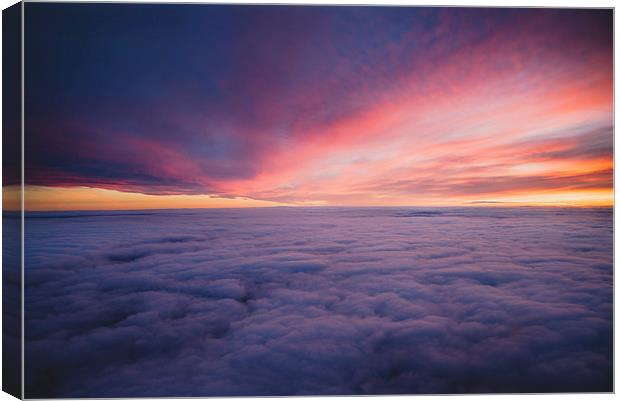 Above the clouds  Canvas Print by Louise Wilden
