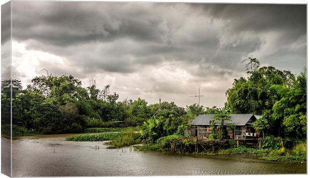  House on the river Canvas Print by Dave Rowlands