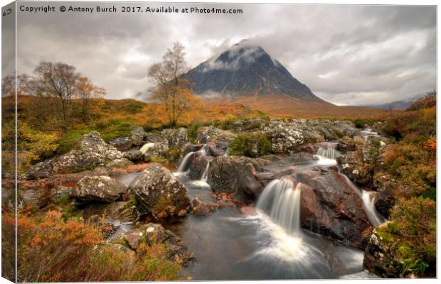  River Coupall waterfall and Buachaille Etive Mor Canvas Print by Antony Burch