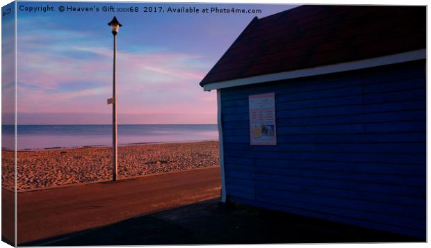 Bournemouth beach Hut and sea  Canvas Print by Heaven's Gift xxx68