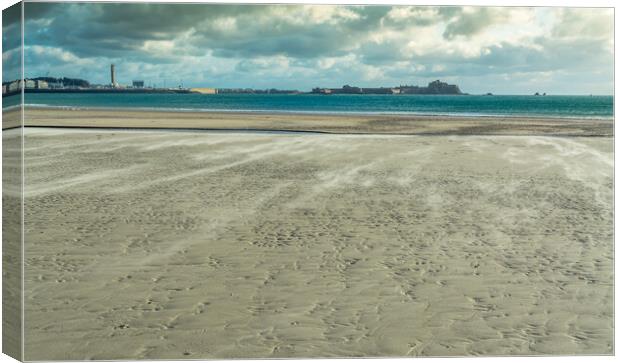 Blowing sand on St Helier beach Canvas Print by Jonathon barnett
