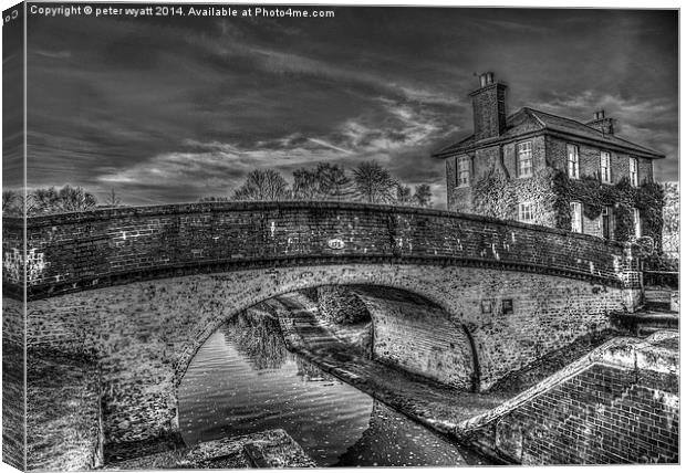  Stockers Lock Bridge and House. Canvas Print by peter wyatt