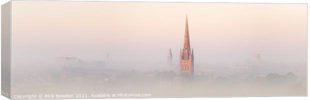 Majestic Norwich Cathedral Emerging from the Mist Canvas Print by Rick Bowden