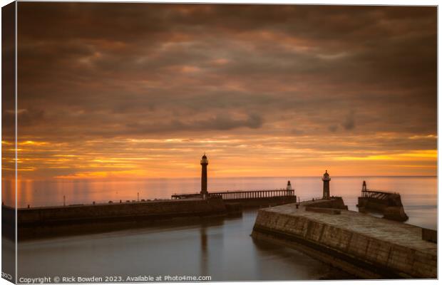 Whitby Pier Sunset Canvas Print by Rick Bowden
