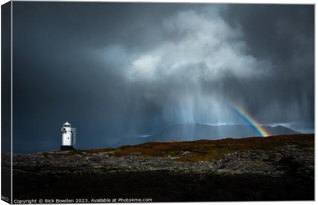 The Rainbow and the Lighthouse Canvas Print by Rick Bowden