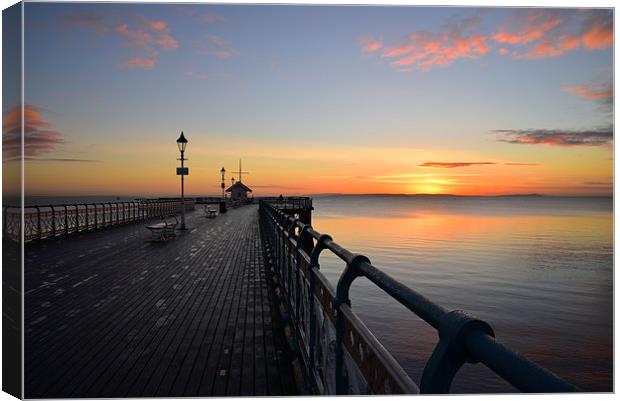 Penarth Pier in vale of Glamorgan sunrise over the Canvas Print by Jonathan Evans