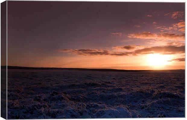  Sunset over the snows Canvas Print by Chris Griffin